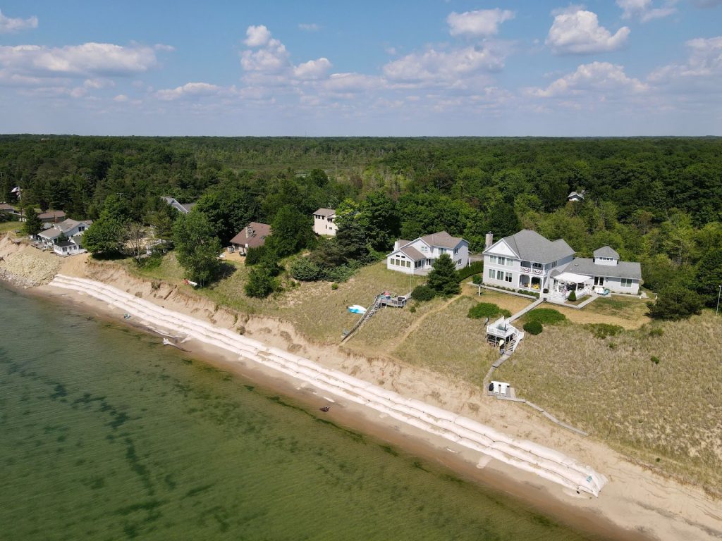 Aerial view of geotextile tubes on the beach